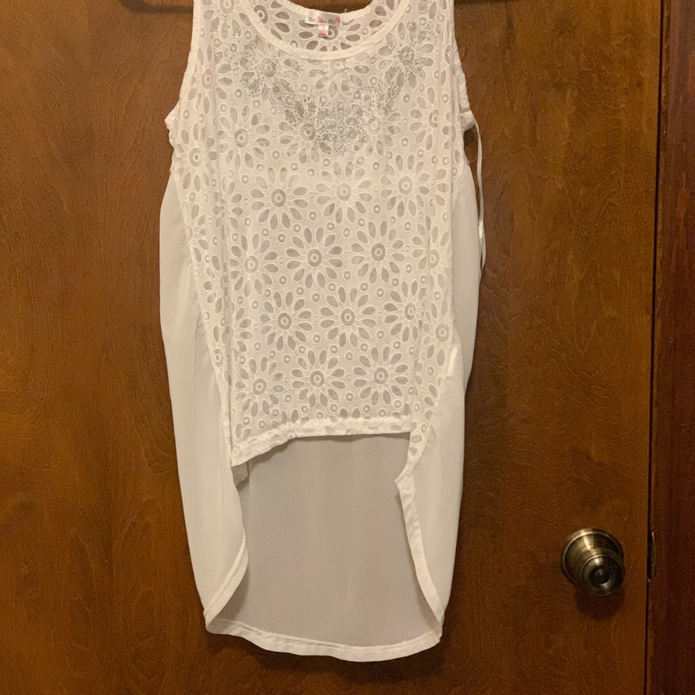 2 sleeveless dressy shirts